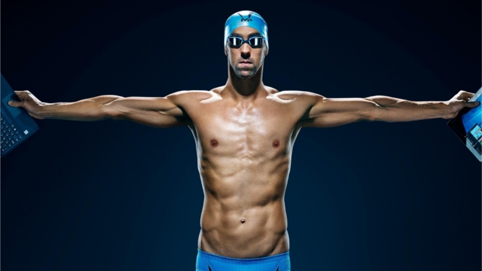 Kollarını açmış olan Phelps'in görseli.