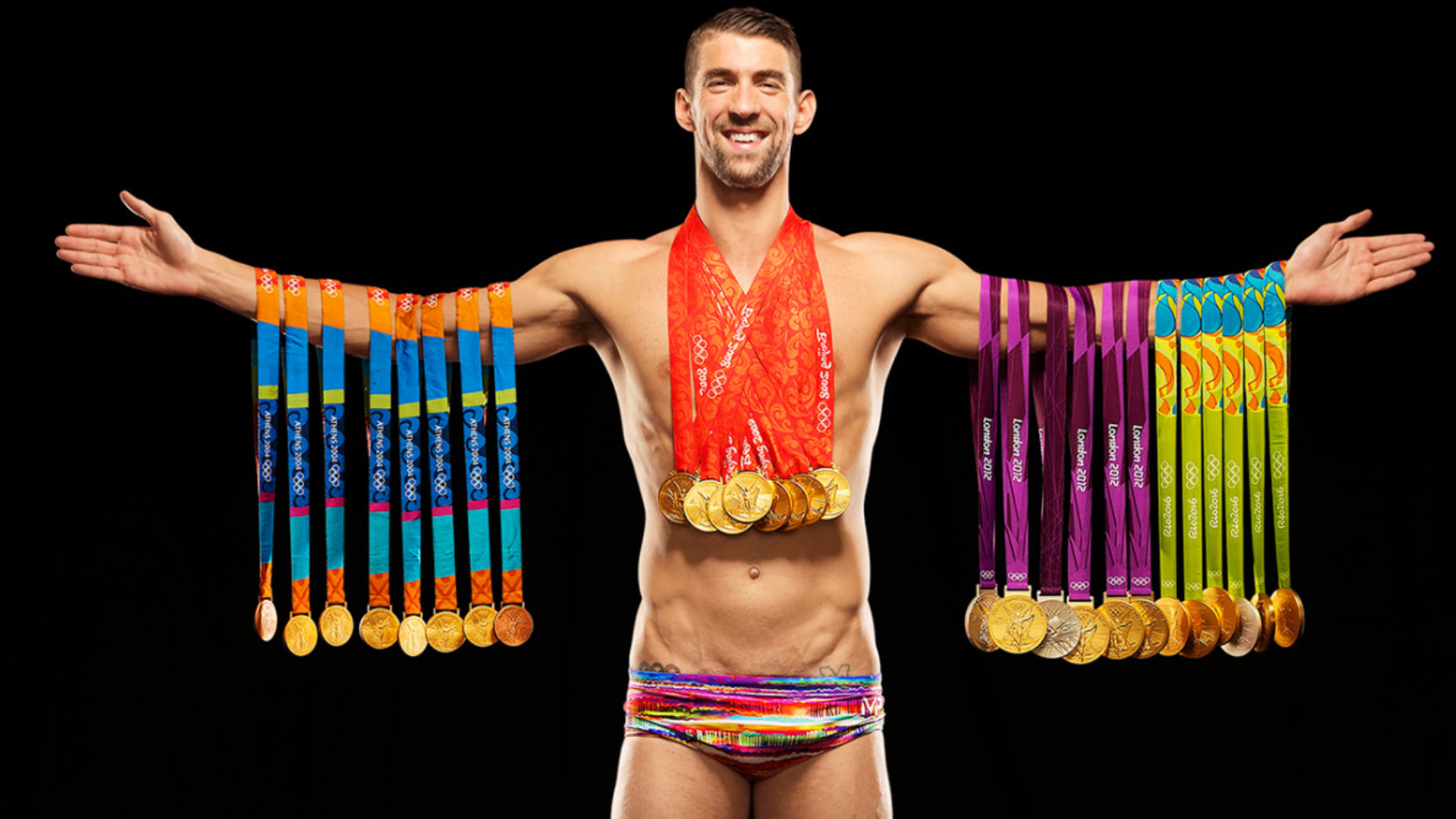 Kazandığı madalyalar ile Michael Phelps görseli.